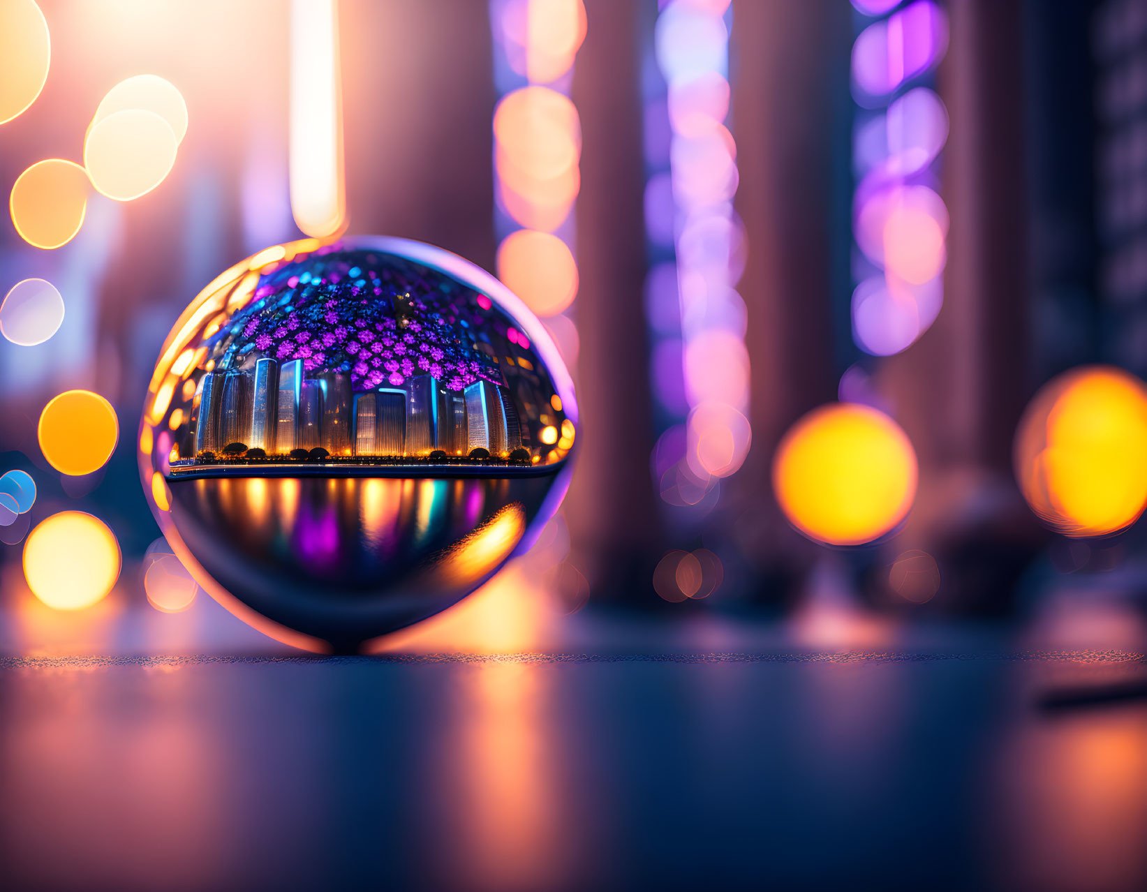 Crystal ball reflecting cityscape at night with vibrant bokeh lights