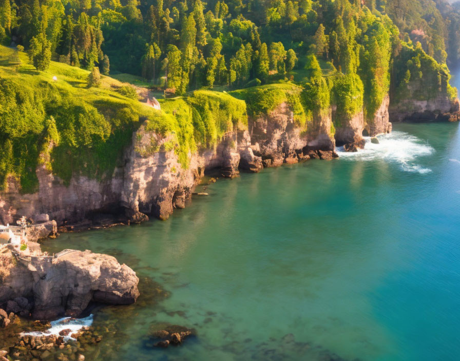 Tranquil landscape: lush green cliffs, turquoise waters, warm sunlight