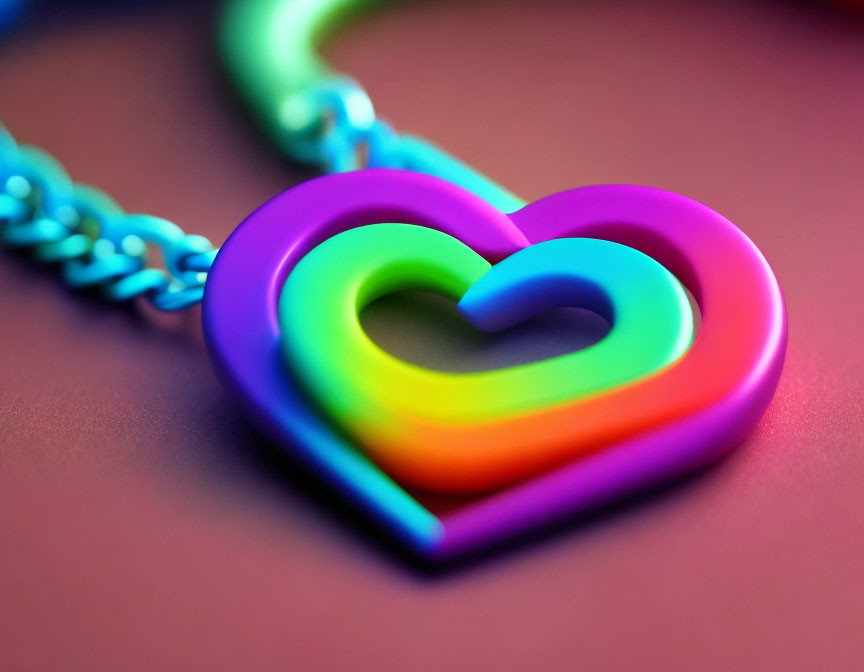 Rainbow Gradient Heart Pendant on Blue Chain Against Red Background