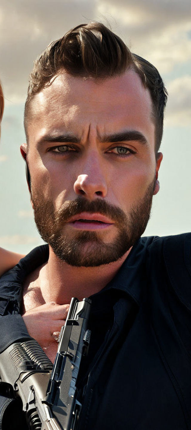 Intense-eyed bearded man with rifle under cloudy sky