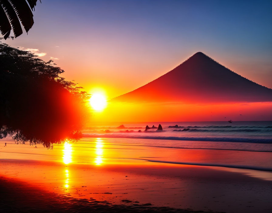 Scenic sunset over ocean with mountain silhouette on tranquil beach