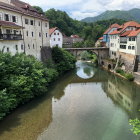 Picturesque Old Town: Stone Houses, Bridge, River, Flowers, Ducks