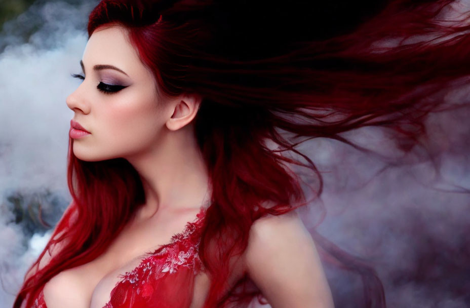 Red-haired woman in flowing red dress against misty backdrop