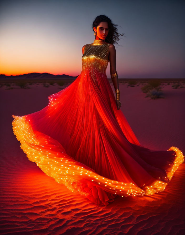 Woman in glowing red dress stands elegantly in desert at dusk