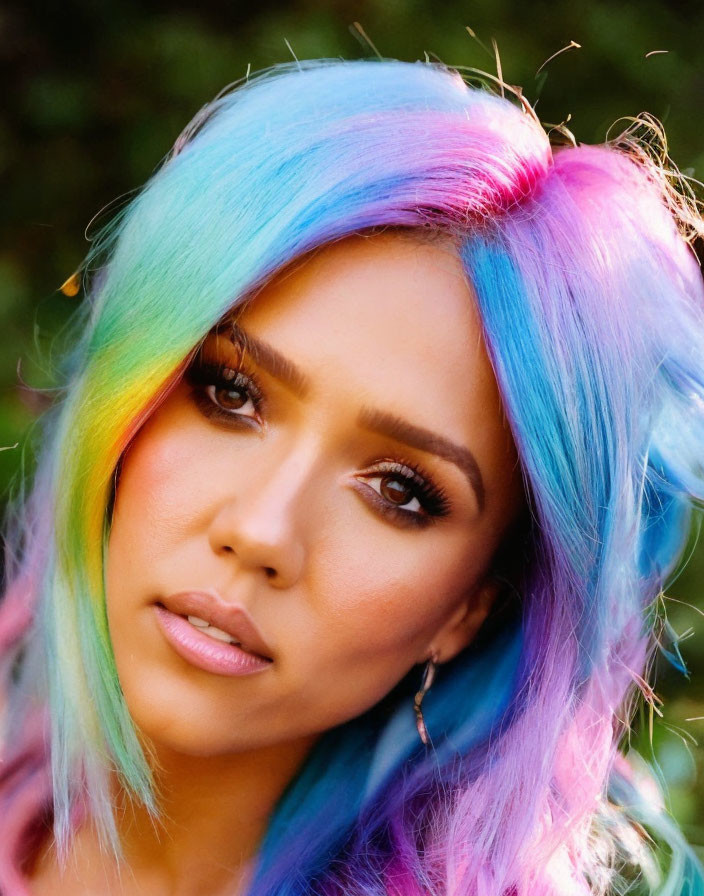 Rainbow-Colored Hair Woman with Blue and Pink Shades in Nature