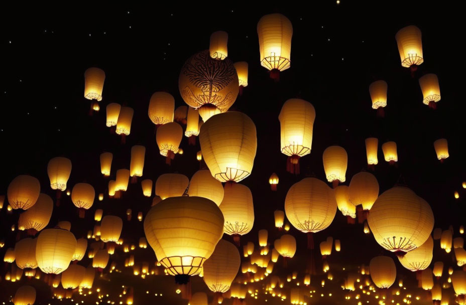 Glowing paper lanterns illuminate serene night sky