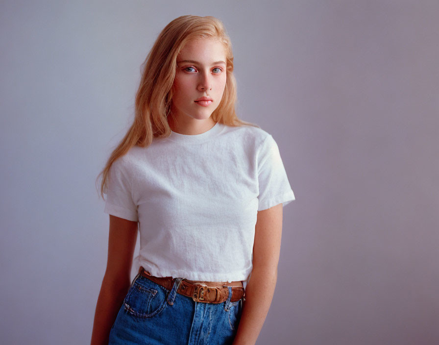 Blonde Woman in White T-Shirt and Denim Pants Portrait