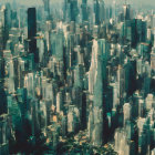 Dense urban skyline with skyscrapers under hazy sky