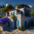 Stone house with blue doors among vibrant shrubs under clear sky