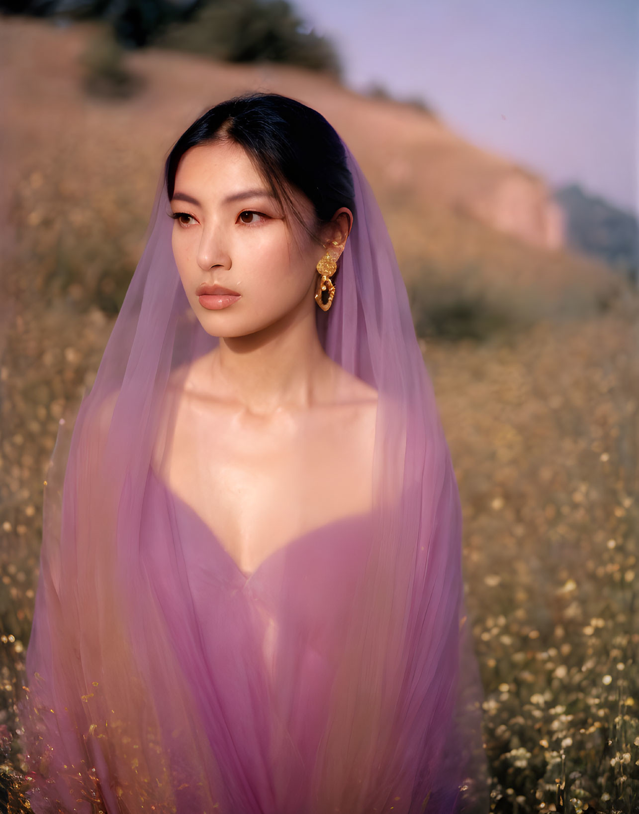 Woman in Purple Veil Surrounded by Yellow Flowers and Earring