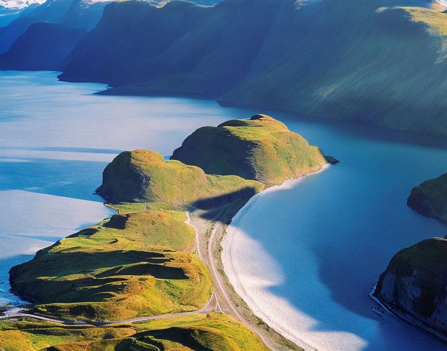 Tranquil Aerial Landscape with Winding Road and Hilly Peninsulas