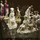 Monochrome artwork featuring elegant female figures and chess pieces.