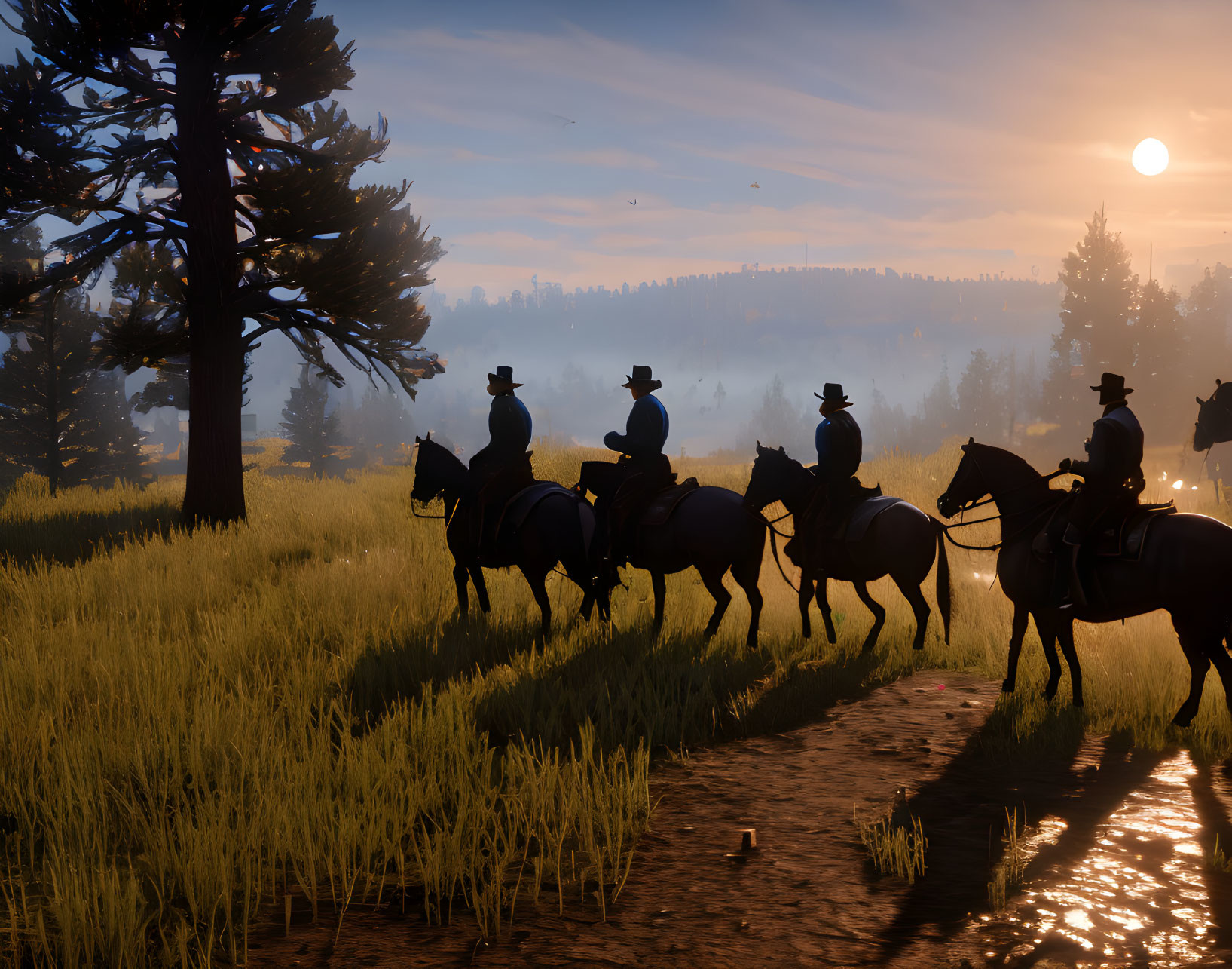 Silhouetted horseback riders at sunset on grassy landscape