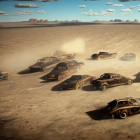 4x4 vehicles in convoy creating large dust trail in desert landscape