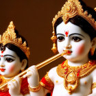 Hindu Deity Figurines with Flute and Gold Adornments