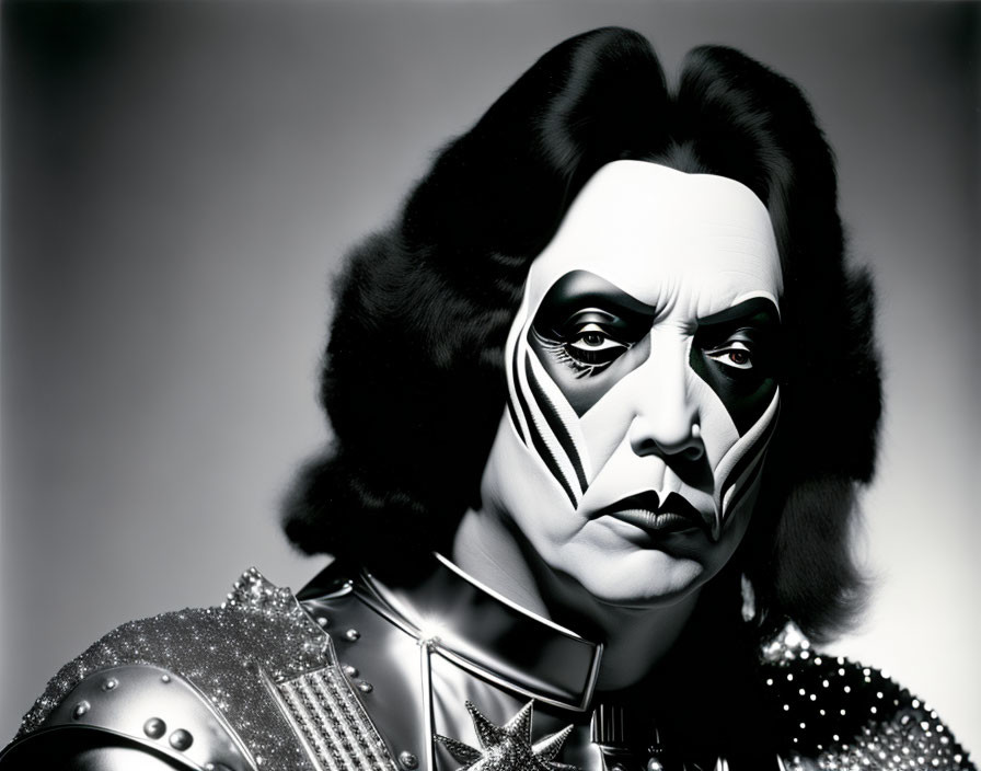 Monochrome photo of person in mime-inspired makeup and futuristic attire