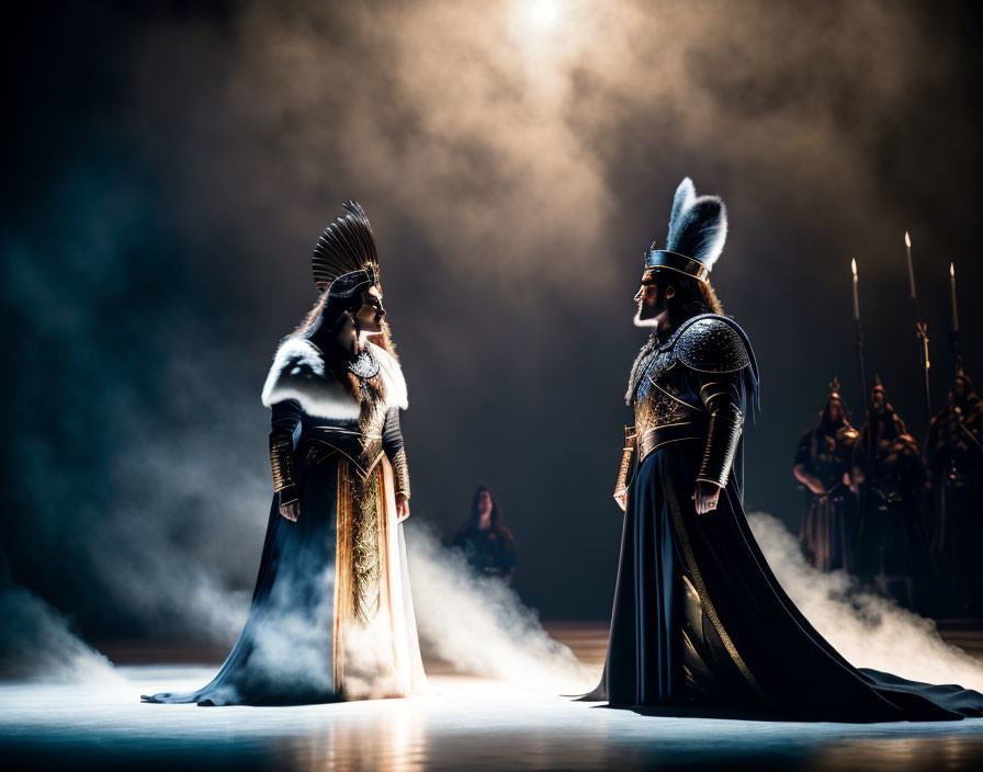 Elaborate historical costumes in misty stage setting.