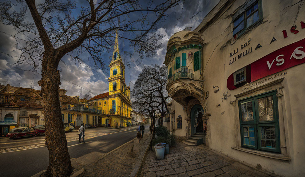 Historical buildings and church on tree-lined street under dramatic sky