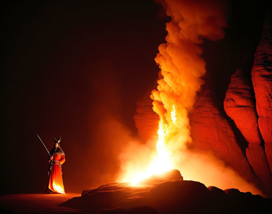 Person in red and orange robe with spear near erupting fire and smoke at night