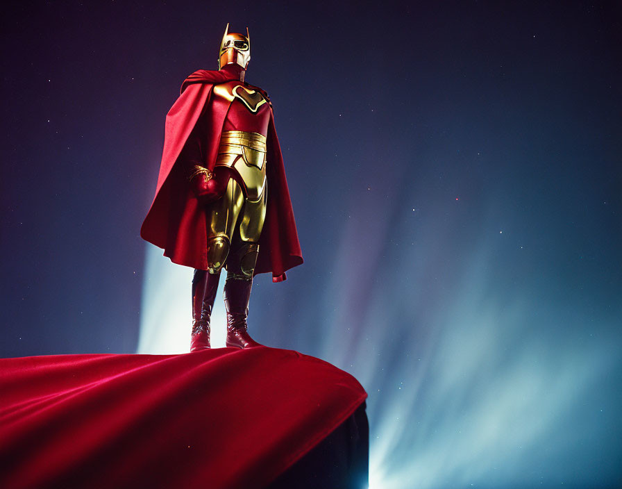 Superhero in Gold and Red Costume Against Starry Night Sky