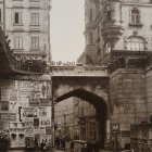 Vintage city street scene with individual holding umbrella in sepia tones