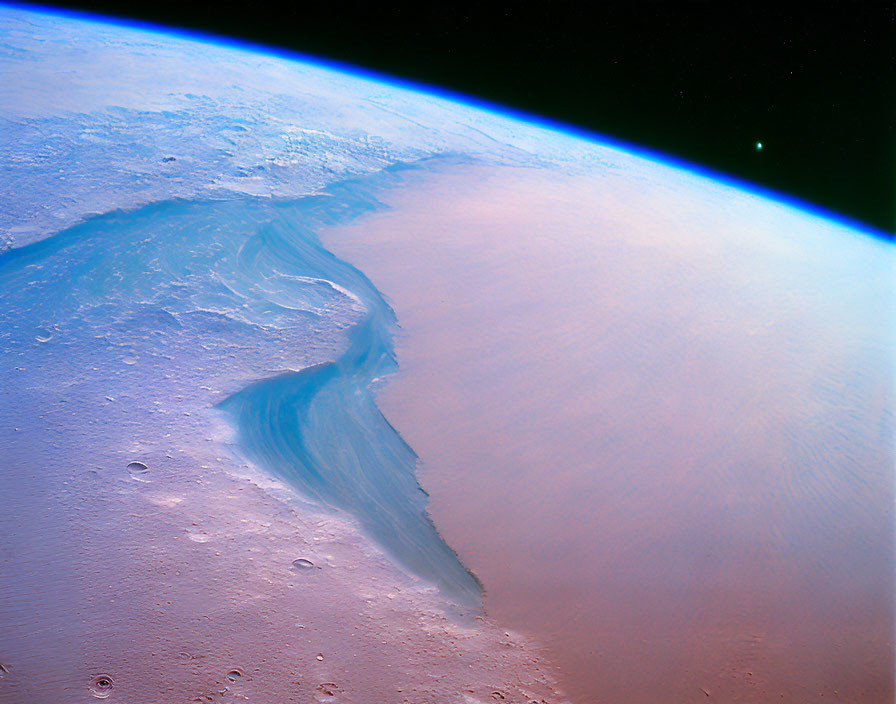 Earth's Limb with Blue Atmosphere Gradient over Tan Desert Landscape