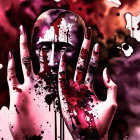 Dark Nail Polish and Rings Hands Against Vivid Backdrop with Mysterious Face Design and Ink Splatters