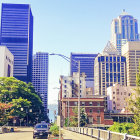 Vibrant cityscape artwork with skyscrapers, river, greenery, and birds