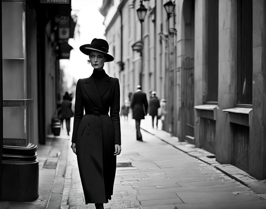 Stylish person in trench coat and hat walking in monochrome cityscape