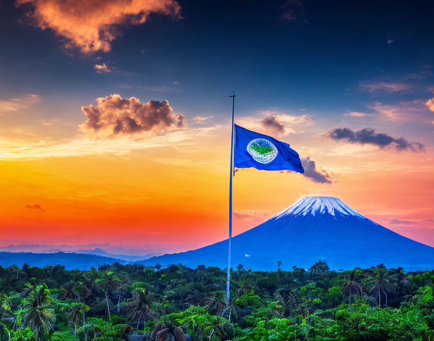 Blue and white flag waving in front of majestic volcano and lush greenery under vibrant sunset sky