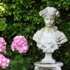 Lush Greenery Surrounds Ornate Stone Fountain