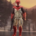 Red and White Mandalorian Armor Figures in Desert Scene