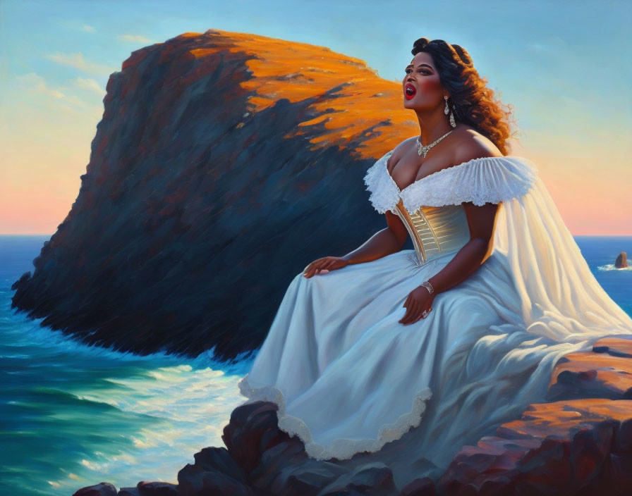 Woman in white gown on rocky cliff by the sea at sunset