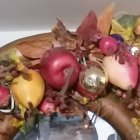 Pink and White Flower Basket with Golden Eggs and Bird Figurine Display