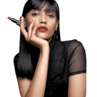 Portrait of Woman with Long Curly Hair and Red Lipstick