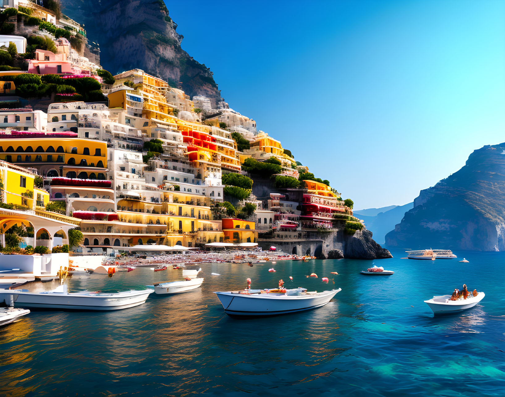 Vibrant Cliffside Buildings Overlooking Bay and Boats