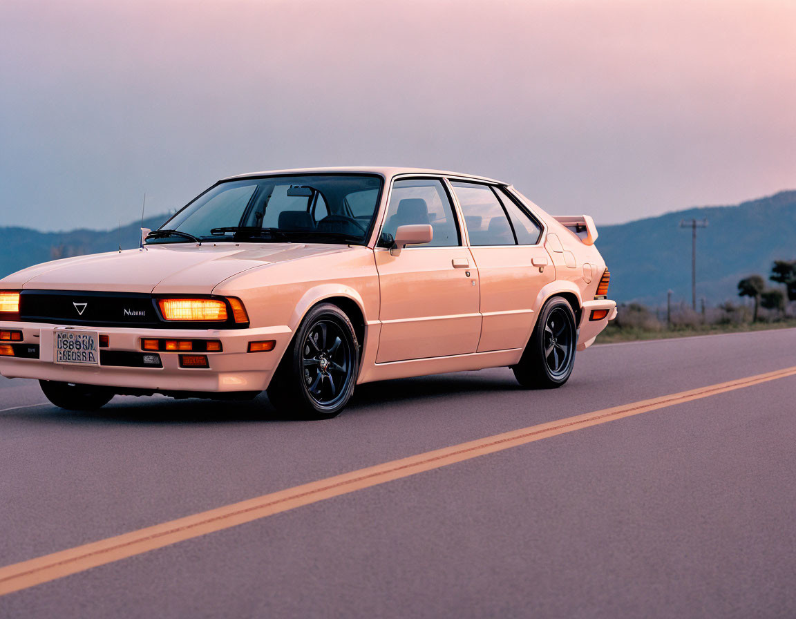 Vintage White and Orange Nissan Car on Asphalt Road at Dusk