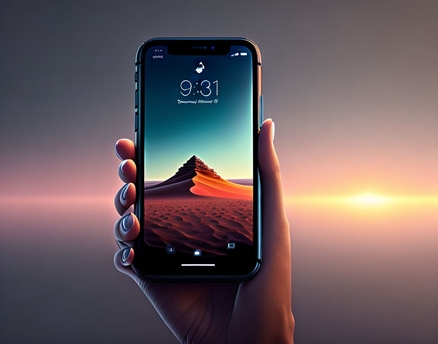 Smartphone displaying desert sand dune at sunrise/sunset.