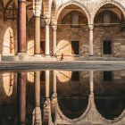 Classical Courtyard with Columns, Arches, Frescoes, and Reflective Pool