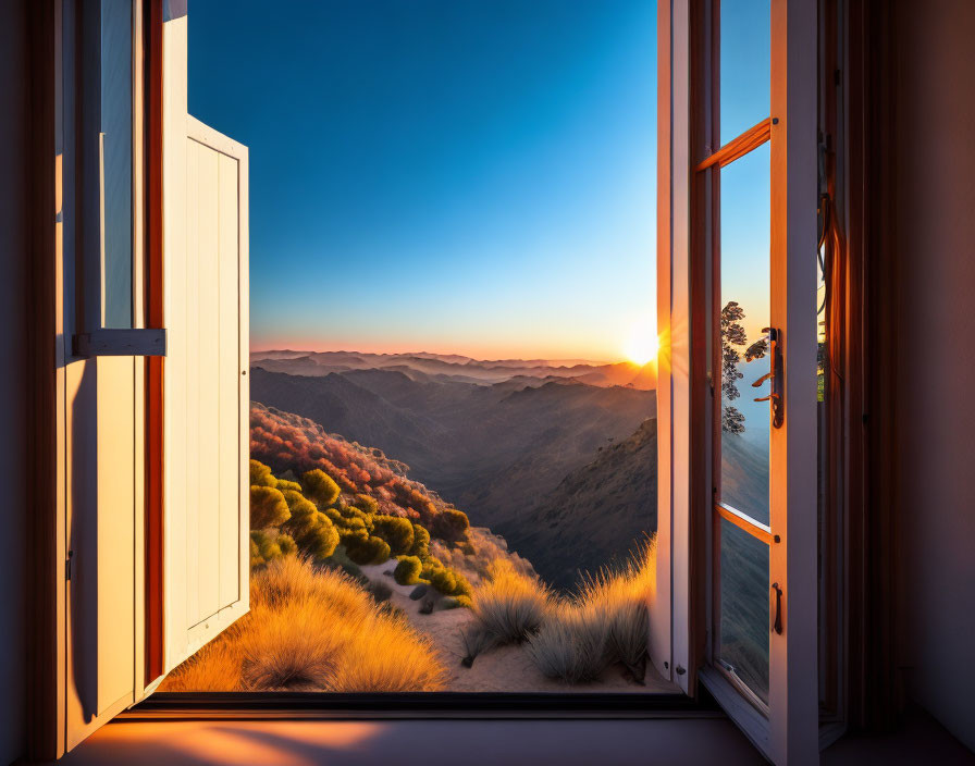 Mountain sunrise view from open window - warm sun glow on hills