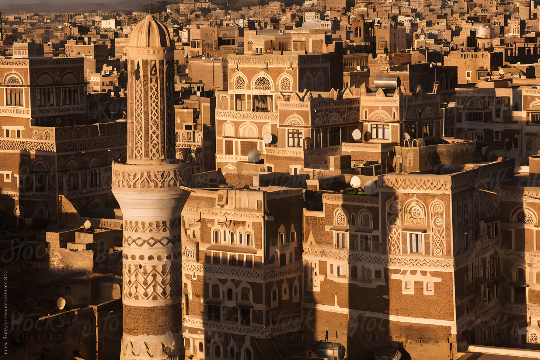 Historic city with ornate buildings at sunset