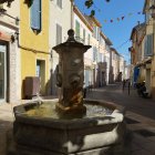 Pastel-Colored Buildings and Fountain on European Street