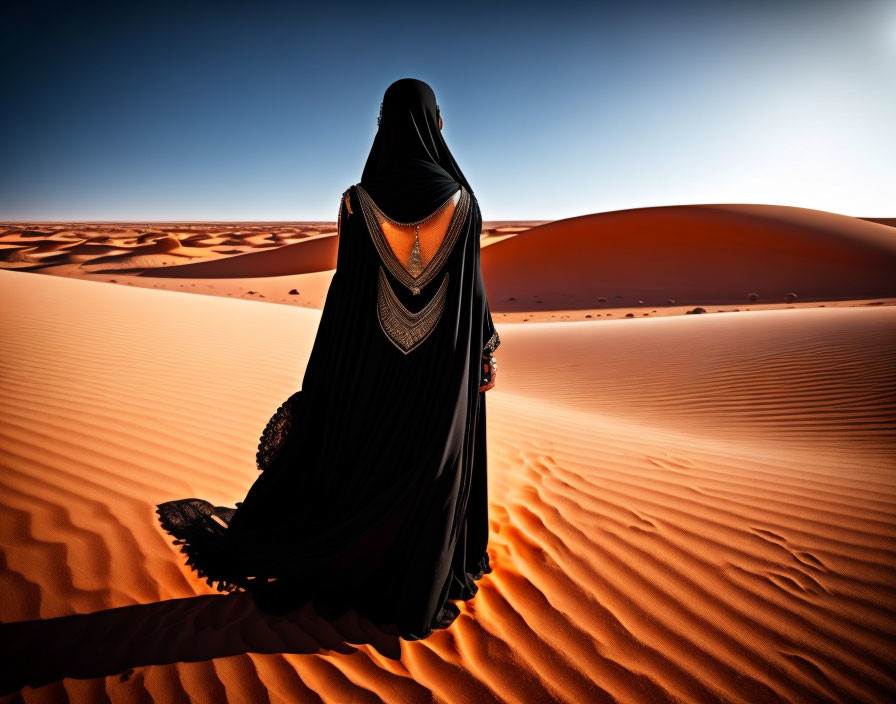 Traditional Black Attire Figure on Desert Dune at Sunset