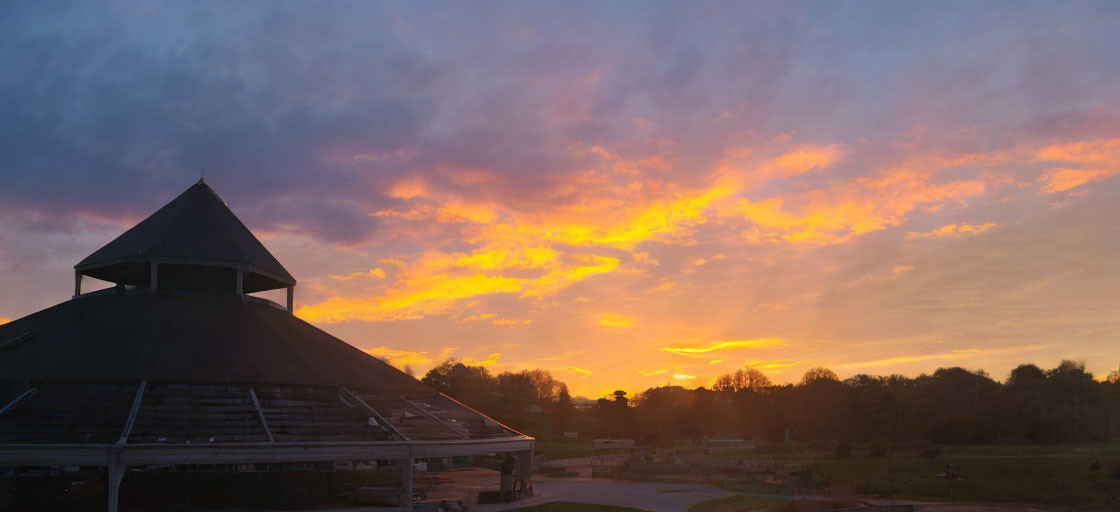 Fiery Sky Sunset Over Park Pavilion & Silhouetted Trees