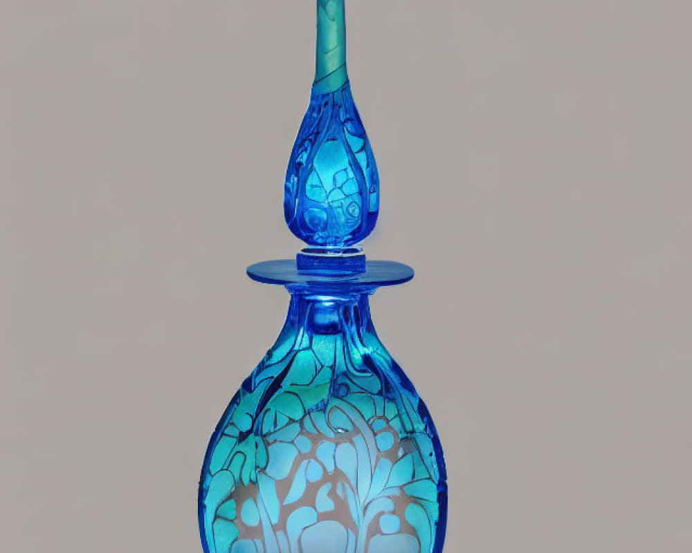 Blue Glass Decanter with White Floral Patterns on Beige Background