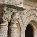 Sculpted Lions with Decorative Ornaments on Intricate Archway