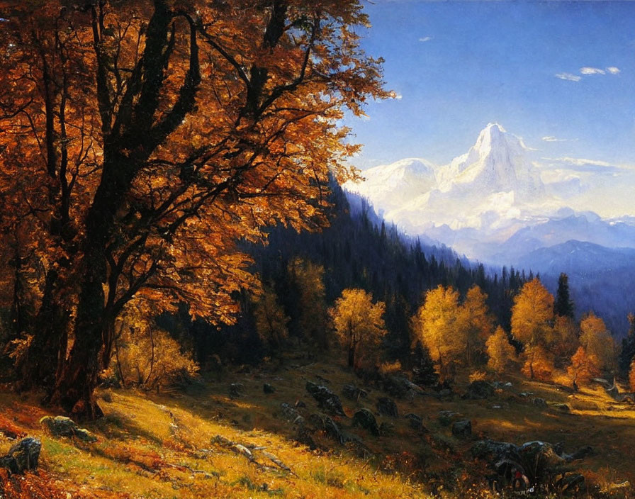 Golden foliage trees, rocky terrain, snow-capped mountain in autumn landscape