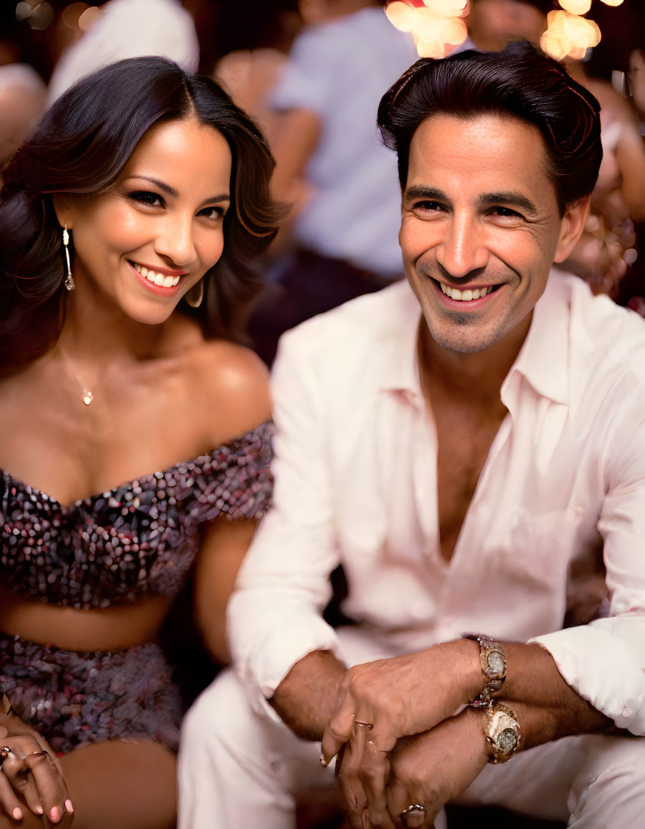 Elegant couple at event in sequined dress and white shirt