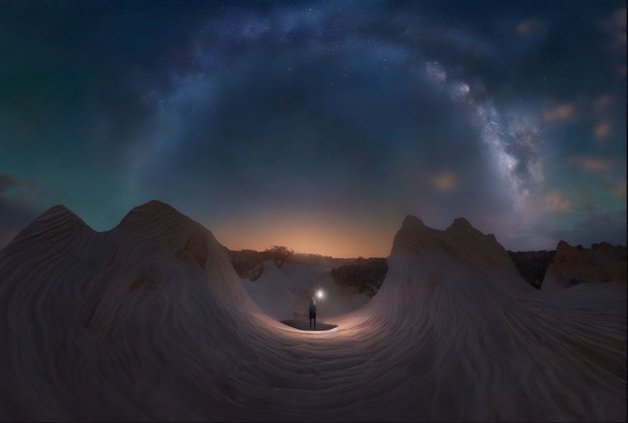 Person with lantern in sandstone canyon under starry night sky