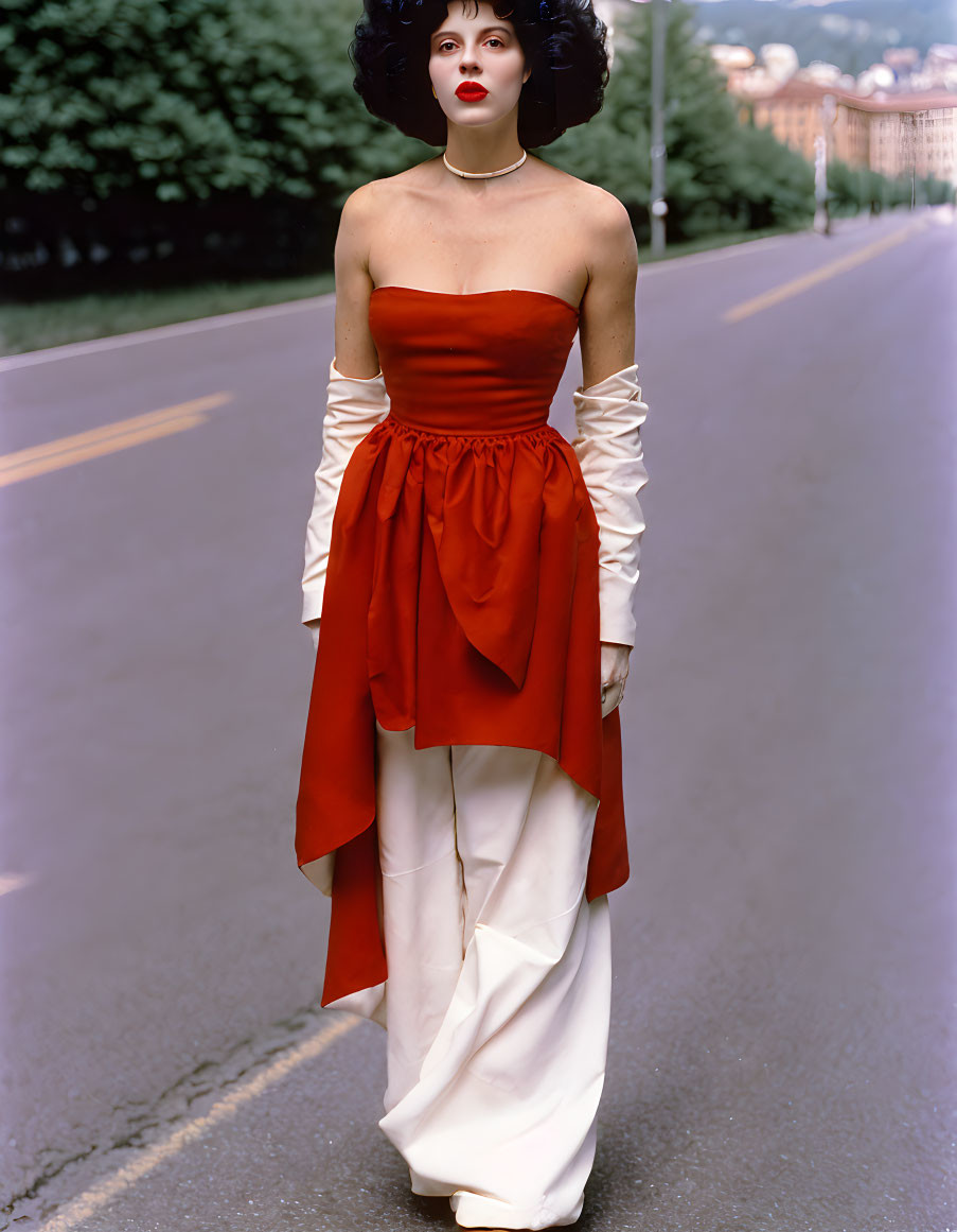 Woman in Red and White Dress on Empty Street with Trees